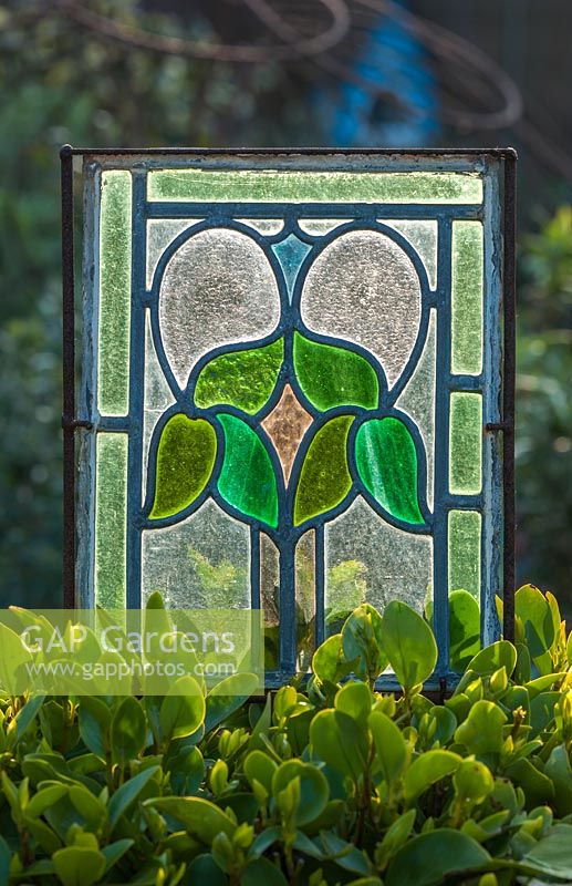 Stained glass in Driftwood garden