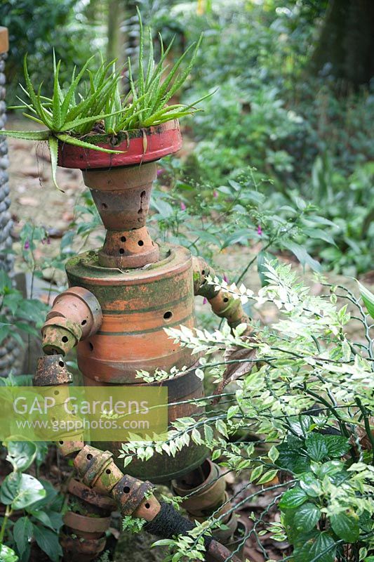 Garden feature made out of flower pots. Kebun Raja Botanical Gardens Bogor.