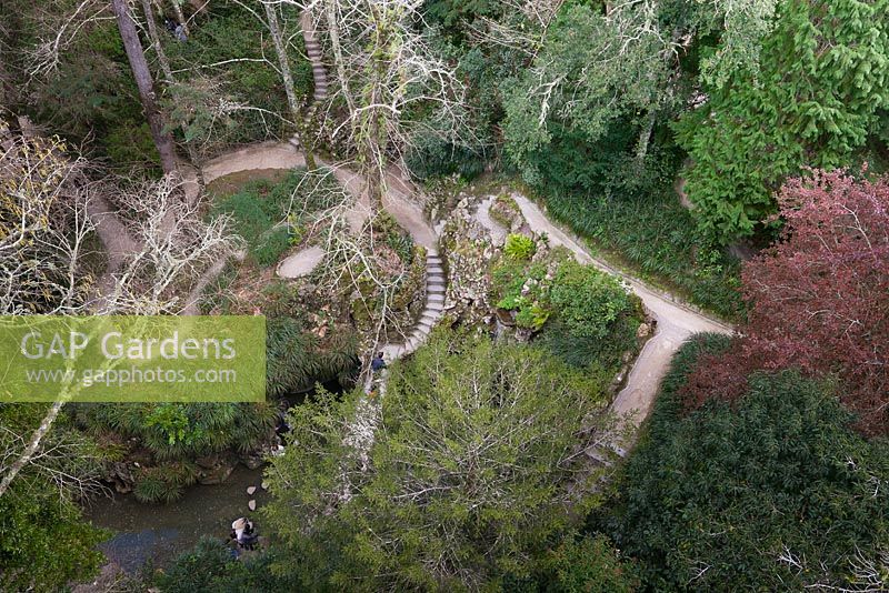 Overhead view of stream, trees and pathways in garden - March, The Quinta da Regaleira, Sintra, Portugal