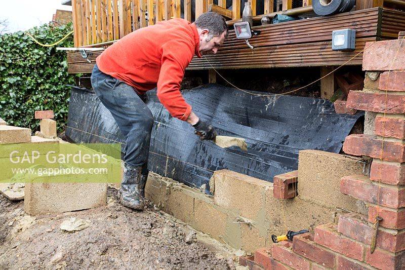 Urban garden makeover, Richmond with ACRES Gardens, bricklayer building retaining wall for existing raised decking