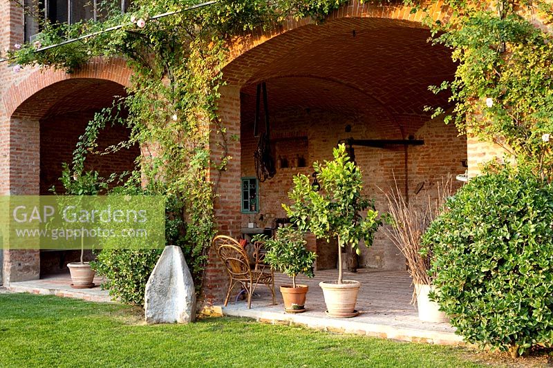 Containers under arches. Govone. Garden project by Anna Regge. Piemonte, Italy.