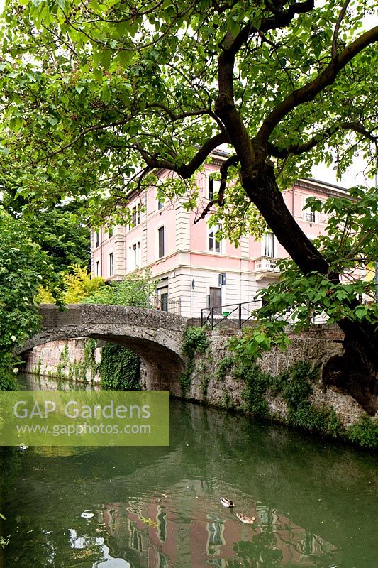 House alongside canal. Villa Singer Garden. Milan. Italy
