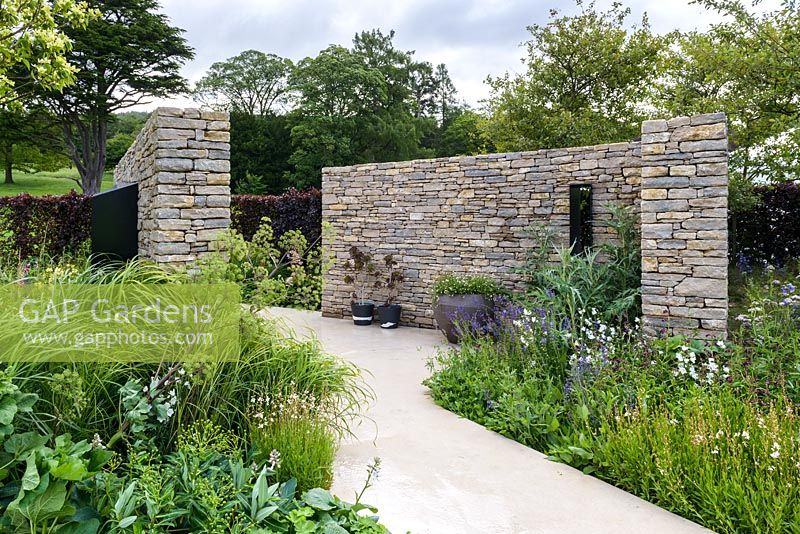 White Campanula in borders - The Wedgwood Garden: A Classic Re-imagined - RHS Chatsworth Flower Show 2017 - Designer: Sam Ovens - Built by Swatton Landscape, James Bird Landscapes - Gold