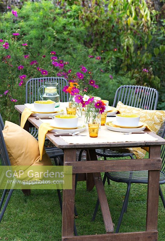 Outdoor table prepared for a Summer party