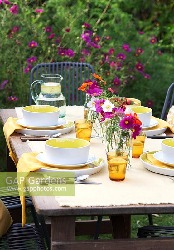 Outdoor table prepared for a Summer party