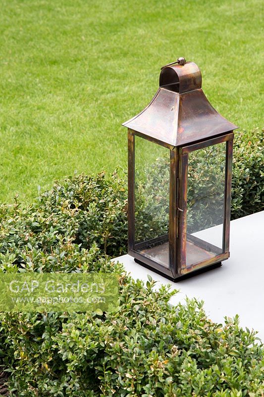Copper lantern on patio