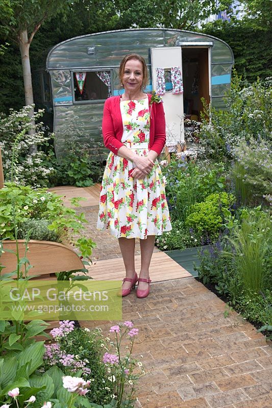 Garden designer Jo Thomspon standing in show garden, The Caravan Club, RHS Chelsea 2012.