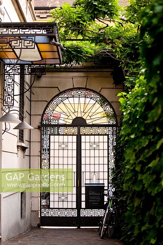 The entrance of the house and garden. Milan. Italy.