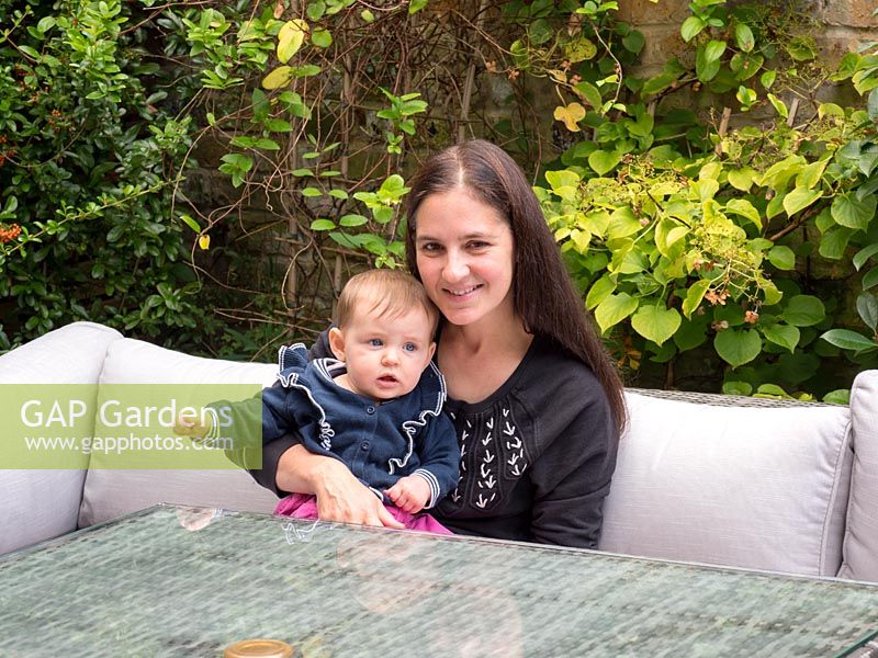 Garden owner Michelle Samson with her baby daughter