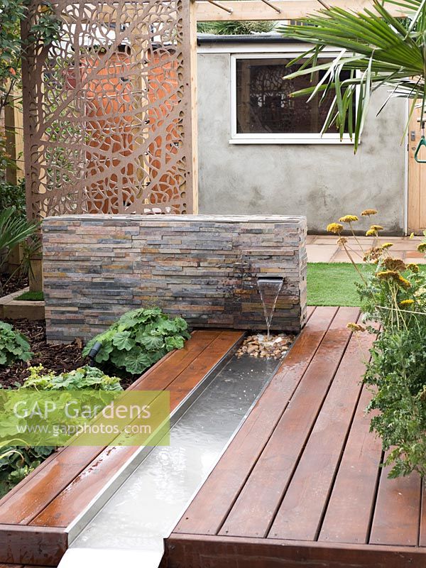 Water feature in small urban garden adds movement