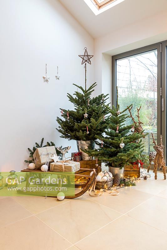Tiered Christmas tree winter scene in living room