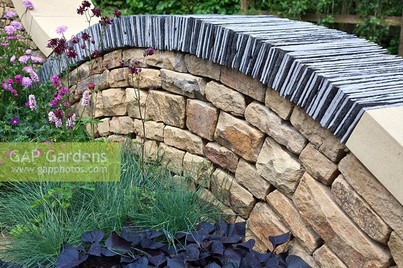 Drystone wall with slate in The Art of Yorkshire Garden designed by Gillespies at the RHS Chelsea Flower Show 2011