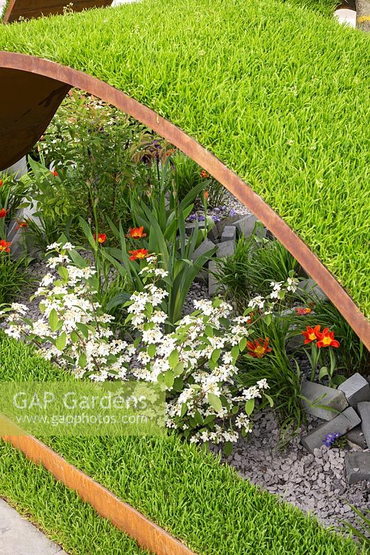 The World Vision Garden at the RHS Chelsea Flower Show 2016. Designer: John Warland. Sponsor: World Vision.