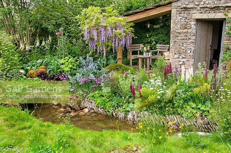Perennial garden with vegetable plants