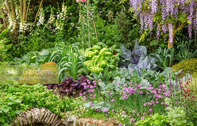 Perennial garden with vegetable plants