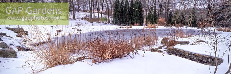 Across frozen Pond Garden at Chanticleer Garden, PA, USA