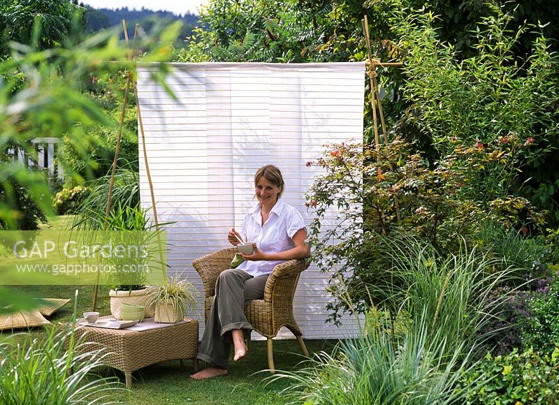 Asian seat in the garden with sun protection