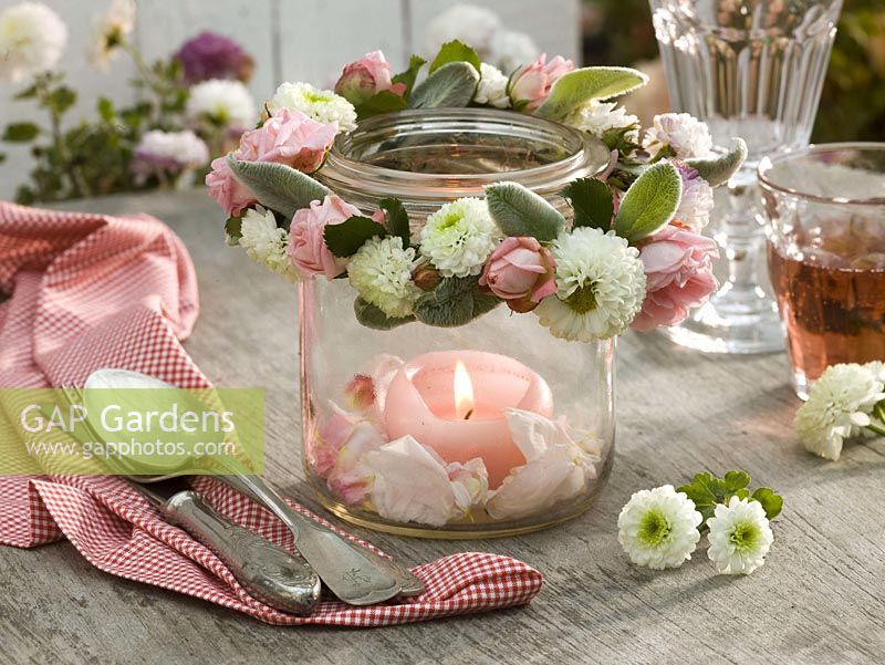 Jar with wreath of pink ( roses ), Chrysanthemum