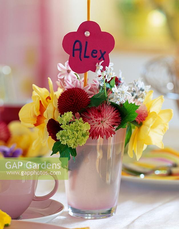 Vernal table decoration - name tag to glass vase with