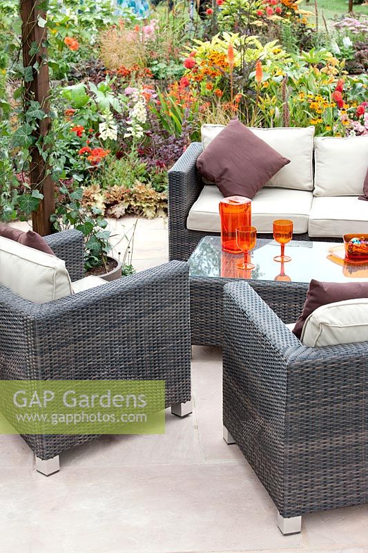 Terrace with wicker garden furniture