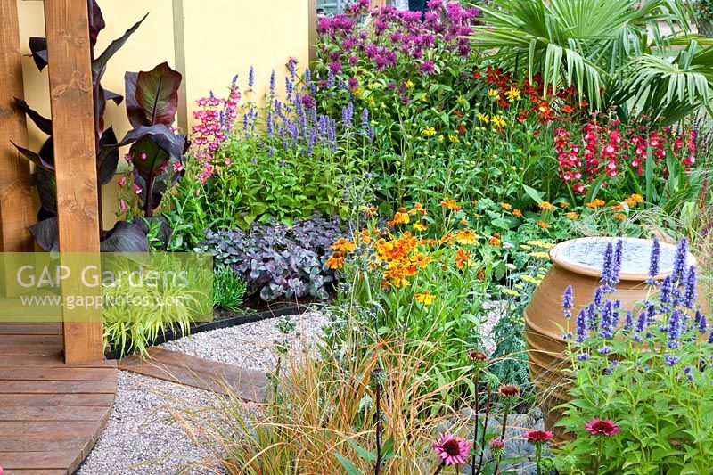Colorful Perennial border with fountain