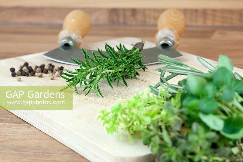 Herbs mixed on cutting board