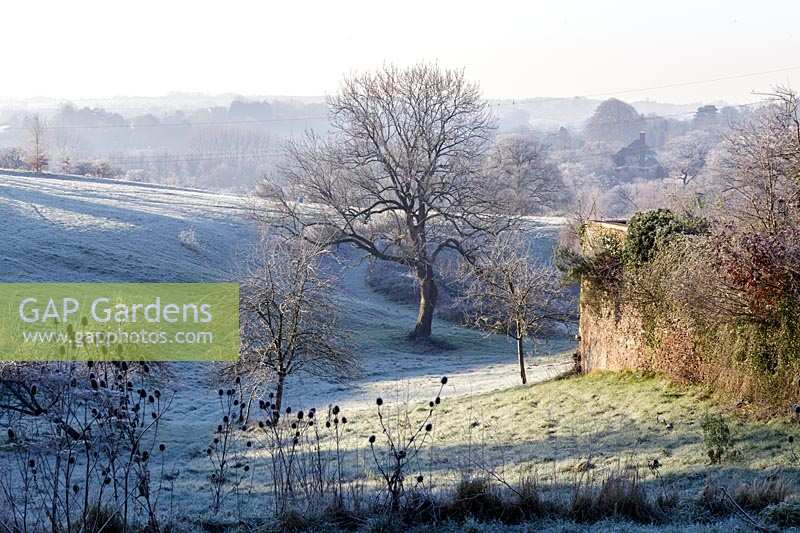 Frosty winter morning at Hanham Court Gardens, Bristol, view across open countryside