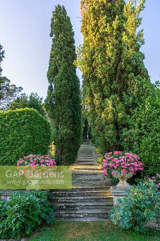 Villa La Foce, Tuscany, Italy. Large garden with topiary clipped Box hedging and views across the Tuscan countryside
