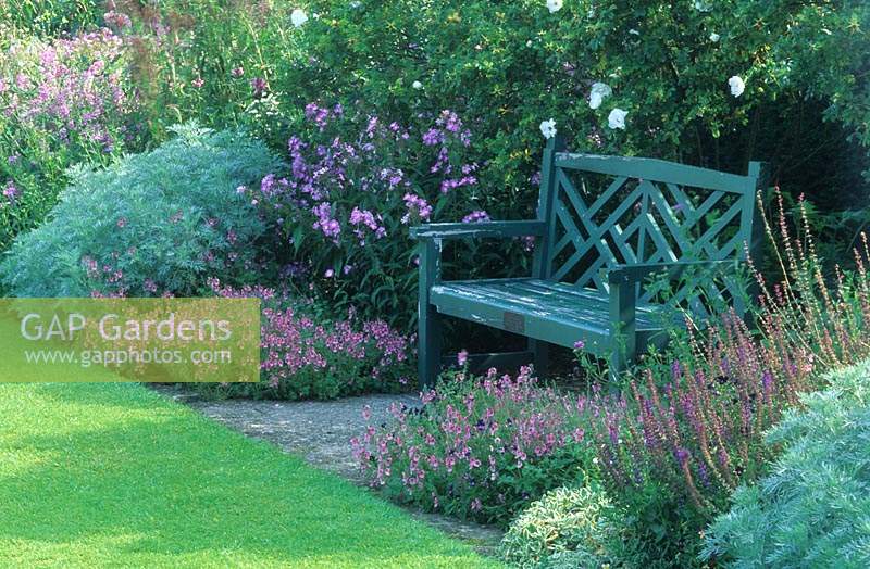 Tintinhul Somerset design Penelope Hobhouse blue border with painted bench summer