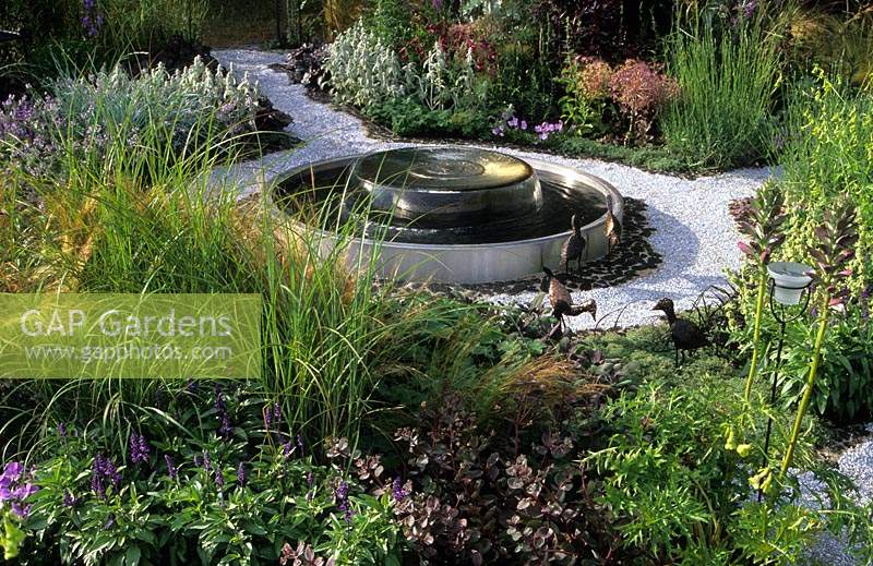 modern contemporary circular stainless steel shallow water feature