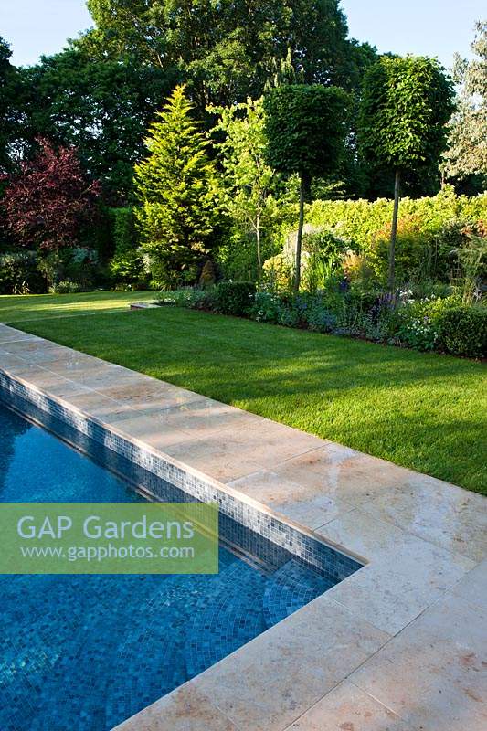 private garden Hampshire design designer landscaping modern contemporary Graduate Landscapes sun sunny view stone suburban patio