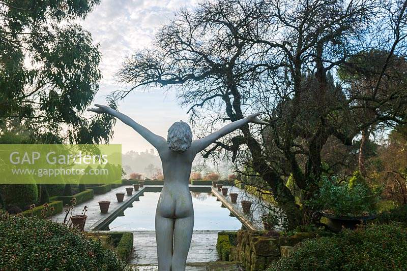 Italian garden with figurative statue