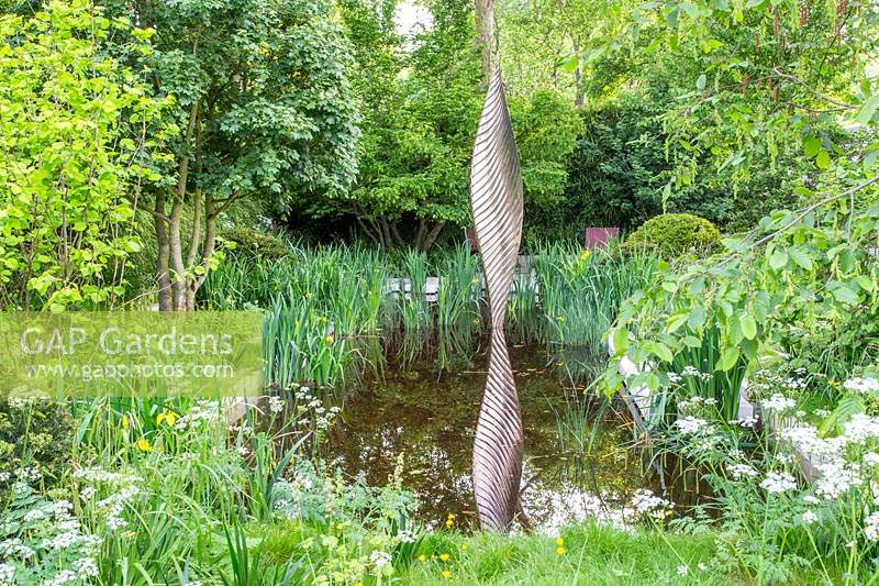 David Harbers bronze sculpture in The Savills and David Harber Garden. Designed by Andrew Duff, Sponsored by David Harber Savills, RHS Chelsea Flower Show, 2019.