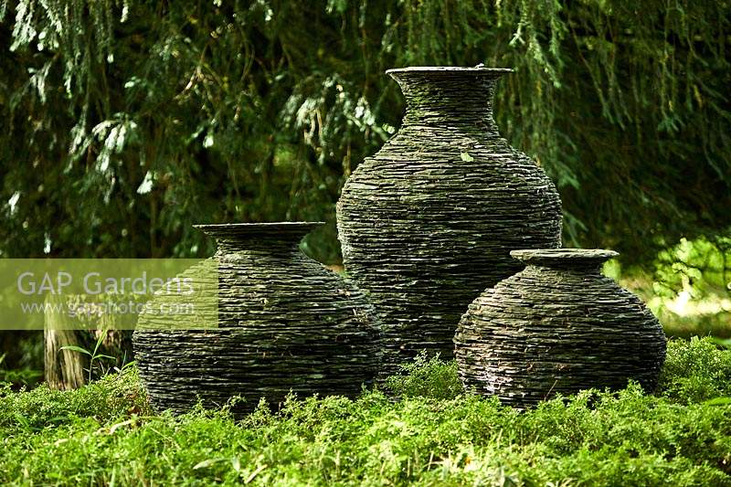 Trio of slate pots in The Winterbourne Garden, highgrove, June, 2019. 