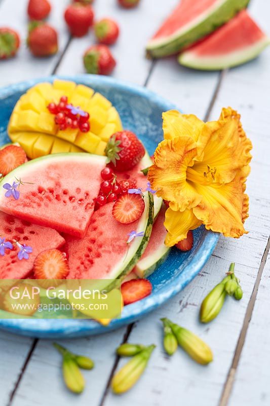 Fresh fruit with daylily flower