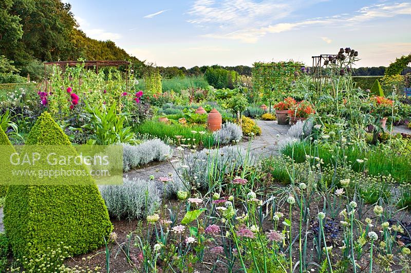 Potager with vegetables, herbs and flowers