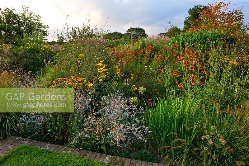 A view of a colourful herbaceous perennial border.