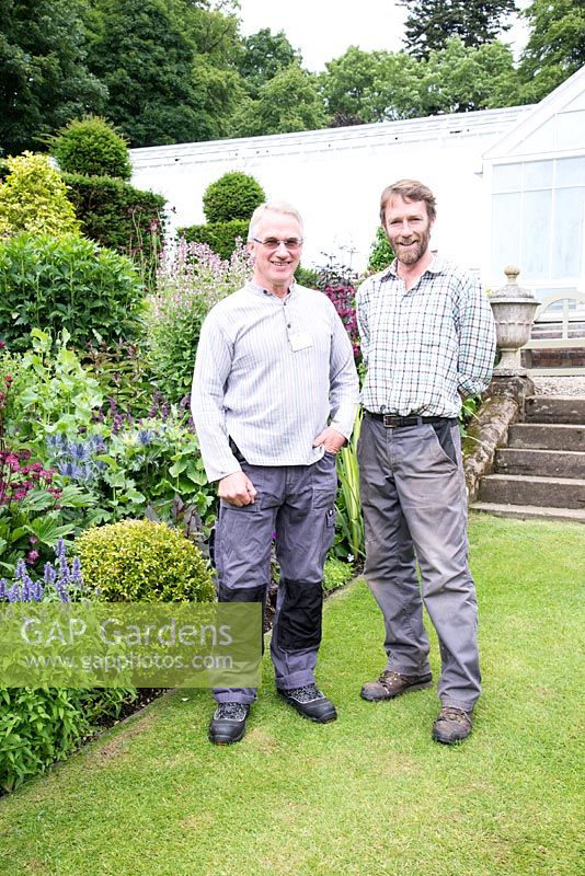 Gardeners in formal gardens, Scotland