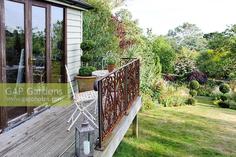 Garden studio with balcony over sloping garden, Dorset
