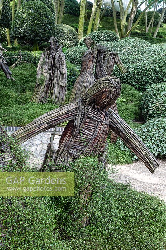 Figures by Agneska Gradzik with Muehlenbeckia complexa. Les Jardins D'Etretat, Normandy, France. 