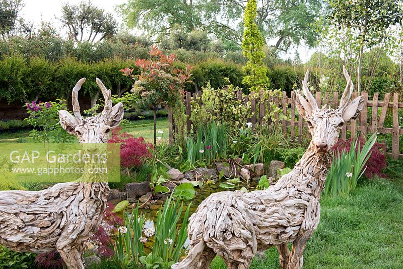 Driftwood Stag sculptures by James Doran-Webb. 'From over the Fence', RHS Malvern Spring Festival, 2018.