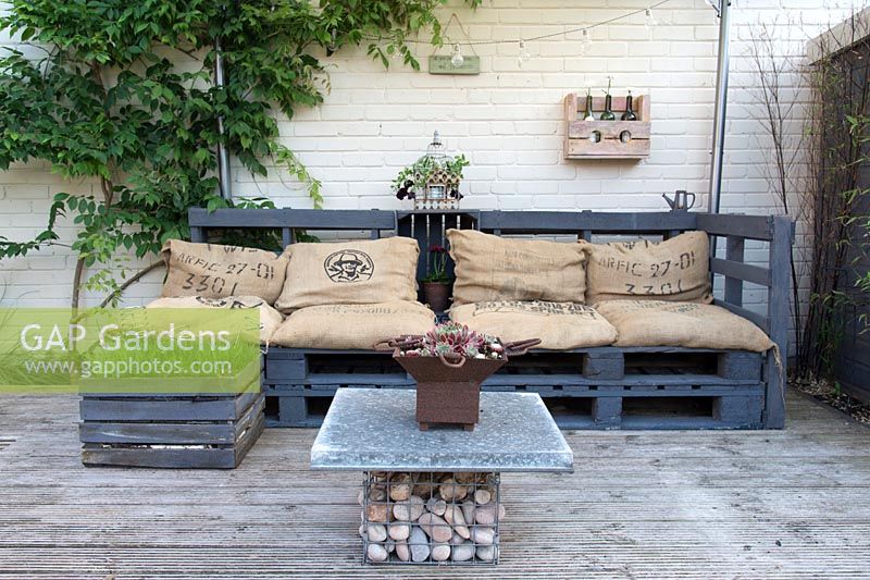 A decked seating area made with recycled materials