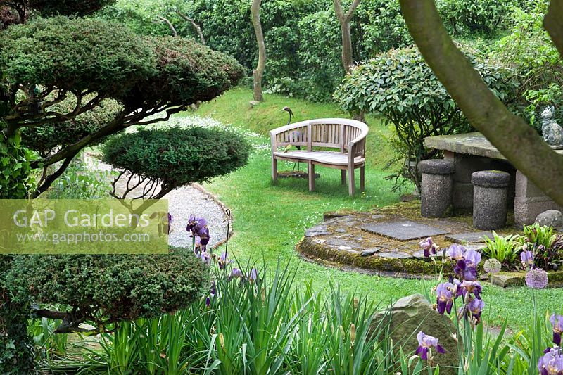 View of bench  in Pure Land Japanese Meditation Garden, Newark, UK.