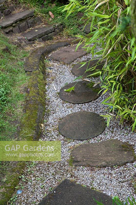 Stepping stones in gravel path at Pure Land Japanese Meditation Garden, Newark, UK.