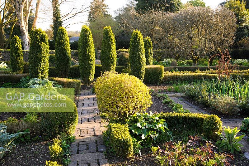 Potager with brick paths and box hedging, England, UK
