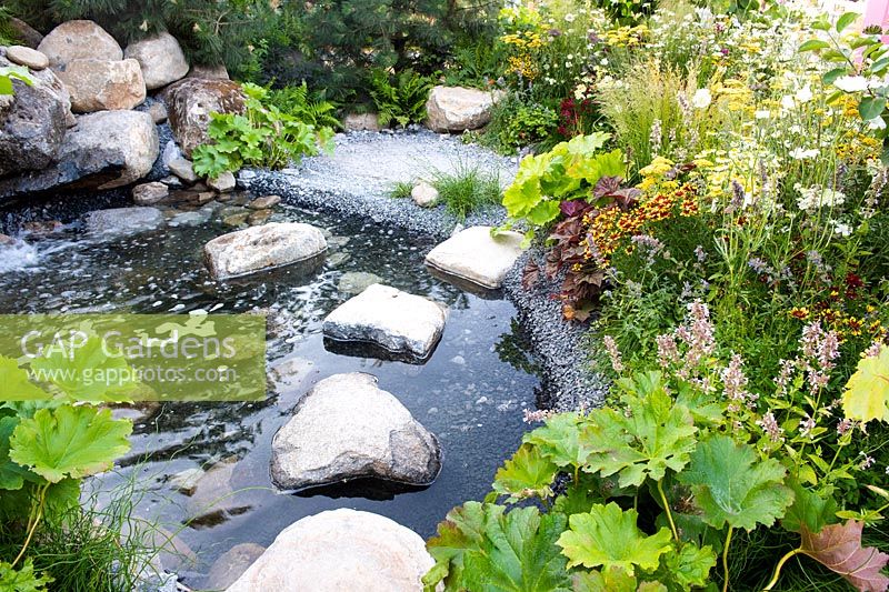 Stepping stones over pond. Great Gardens of the USA: The Oregon Garden, RHS Hampton Court Palace, 2018