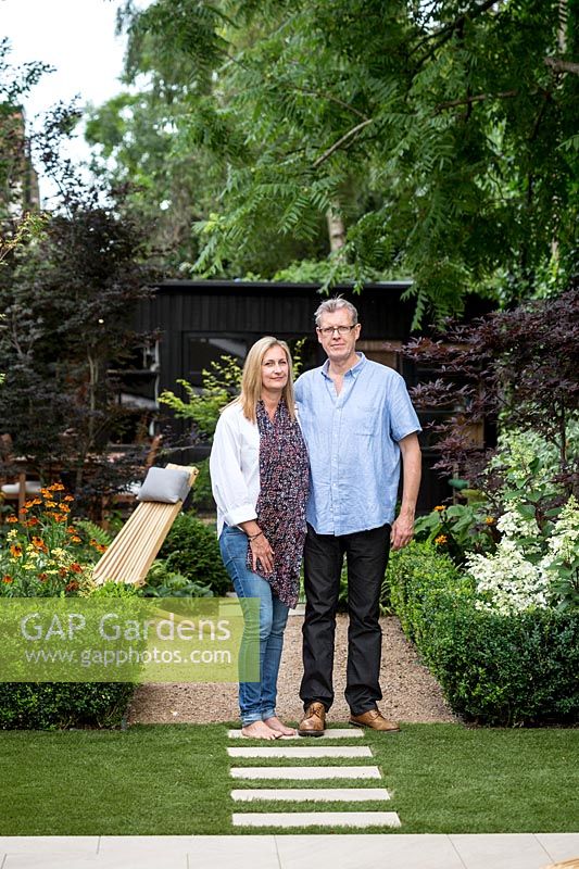 Claire and Sean McHugh in garden designed by Nick Gough