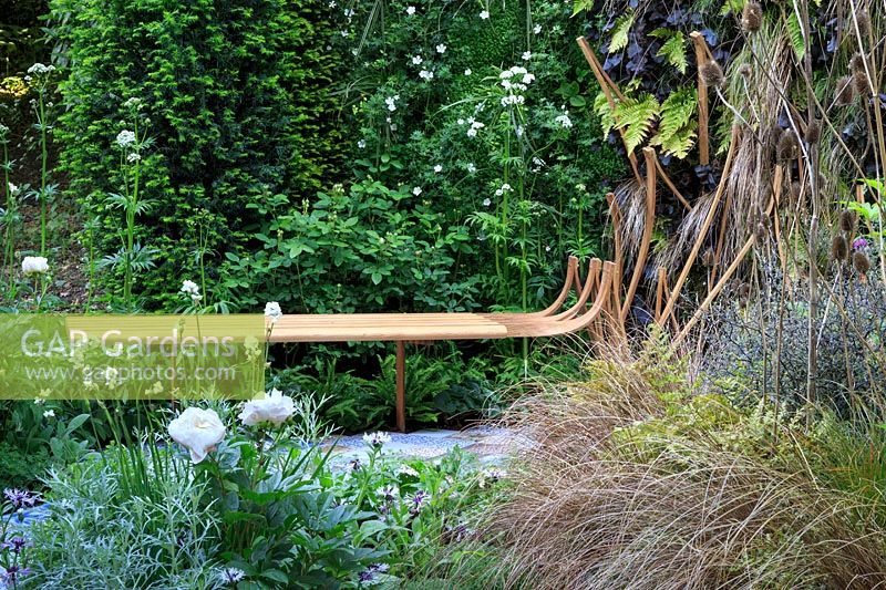 The Embroidered Minds Epilepsy Garden - Bench in garden - Sponsor: Embroidered Minds - RHS Chelsea Flower Show, 2018