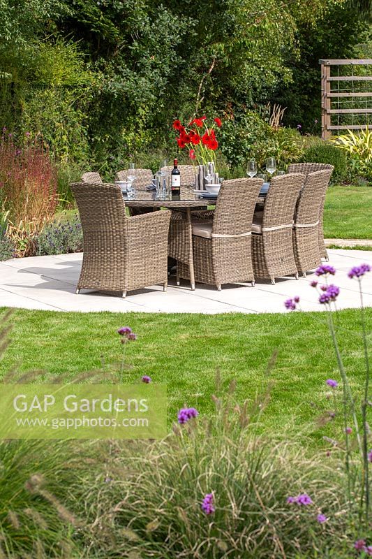 Outside dining table on circular lawn