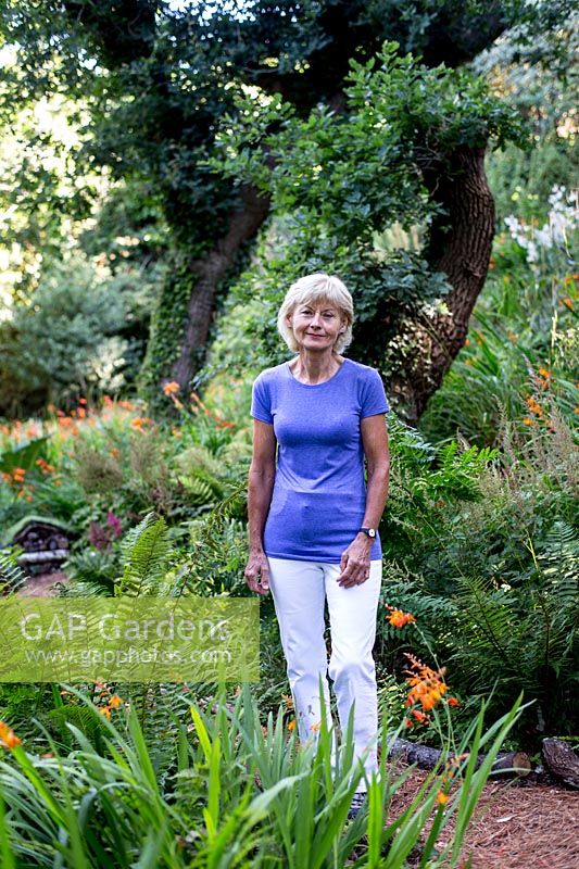 Pam Woodall in her wildlife garden 'Pinecombe' in Dorset, UK